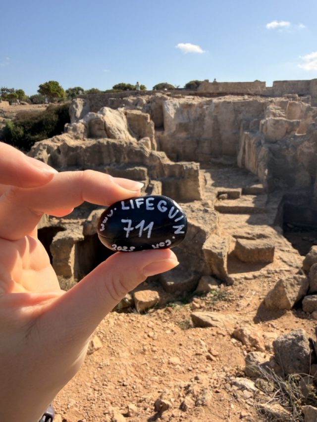 Hand-painted penguin stone #711 hidden at Close to Tomb 2 at Tombs of Kings, Paphos, Cyprus (photo 2 of 5)