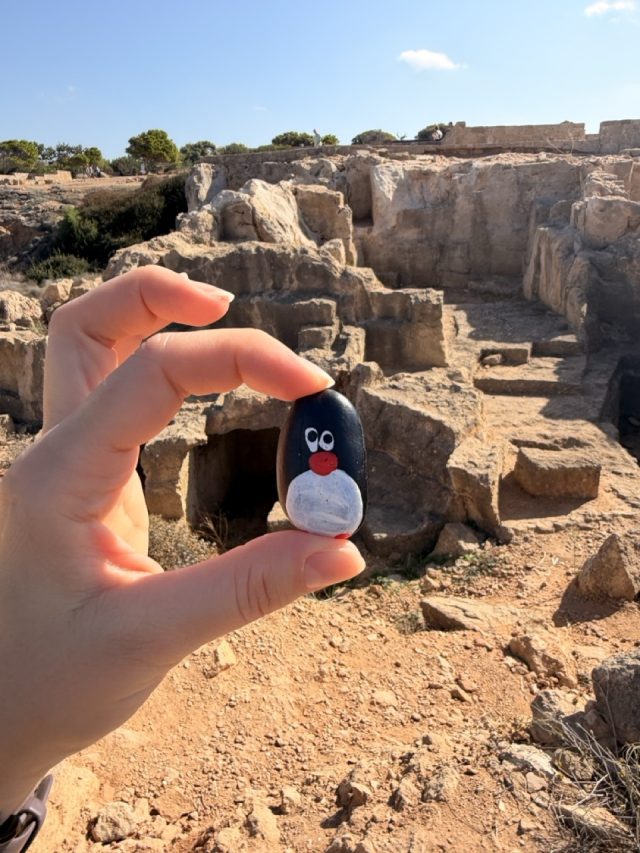Hand-painted penguin stone #711 hidden at Close to Tomb 2 at Tombs of Kings, Paphos, Cyprus (photo 3 of 5)