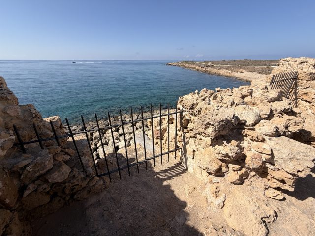 Hand-painted penguin stone #740 hidden at Inside Pafos Castle, Paphos, Cyprus (photo 2 of 5)