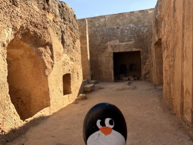 Hand-painted penguin stone #753 hidden at Tomb 7 at Tombs of Kings, Paphos, Cyprus (photo 2 of 5)