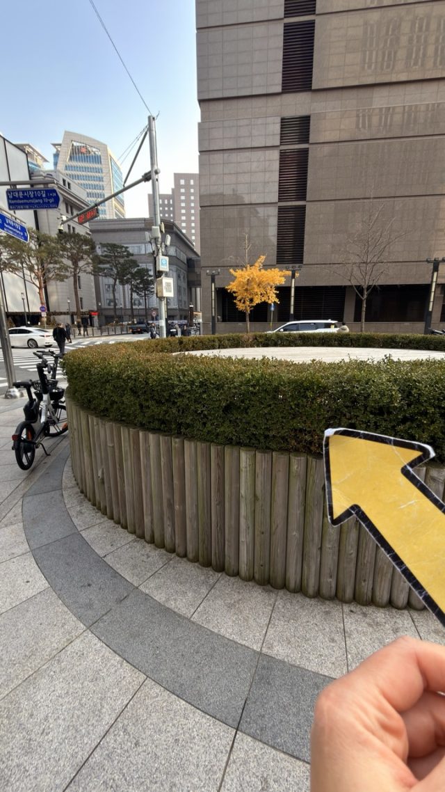 Hand-painted penguin stone #721 hidden at Namdaemun Market, Seoul, South Korea (photo 3 of 5)