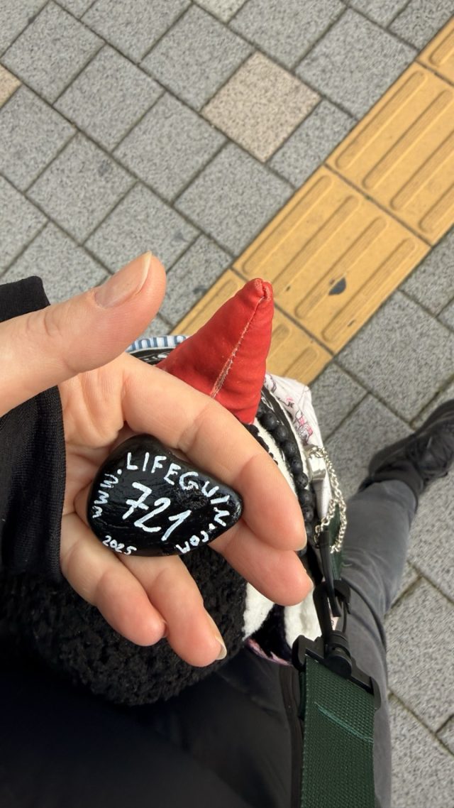 Hand-painted penguin stone #721 hidden at Namdaemun Market, Seoul, South Korea (photo 4 of 5)