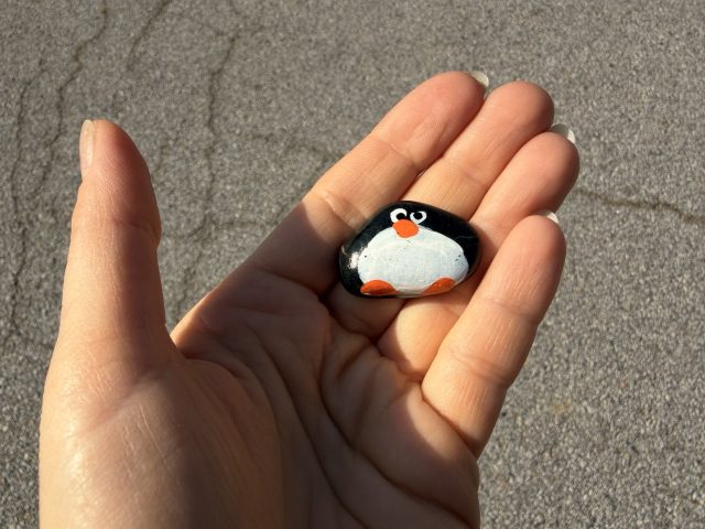 Hand-painted penguin stone #773 hidden at Sign at Parking lot, DMZ, South Korea (photo 3 of 5)