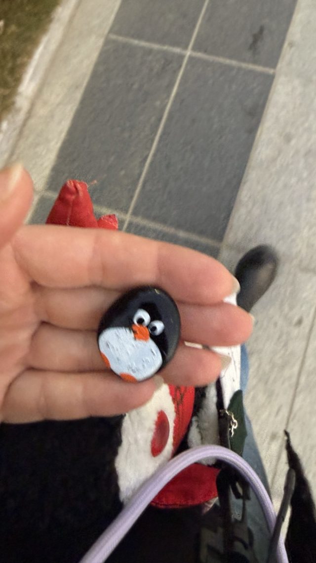 Hand-painted penguin stone #776 hidden at Haeundae Beach, Busan, South Korea (photo 2 of 5)