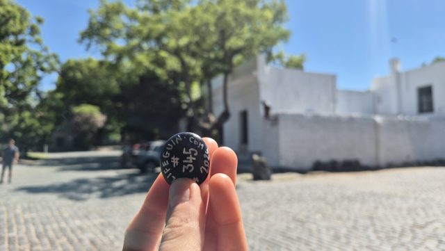 Hand-painted penguin stone #345 hidden at Casco historico de Colonia, Colonia del Sacramento, Uruguay (photo 3 of 5)