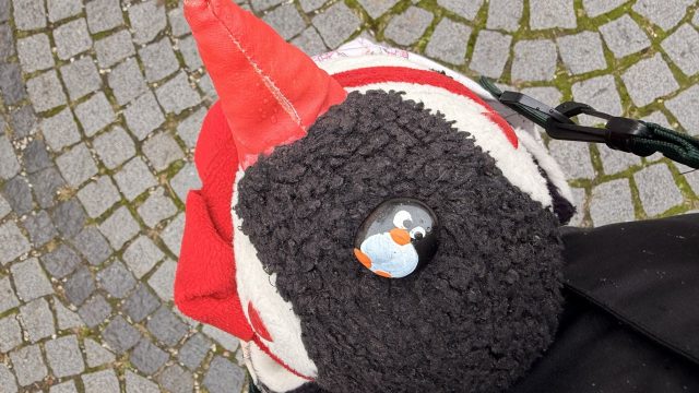 Hand-painted penguin stone #803 hidden at Kremsmunster Abbey, Kremsmunster, Austria (photo 2 of 5)