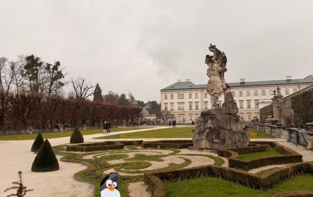 Hand-painted penguin stone #809 hidden at Mirabellgarten, Salzburg, Austria