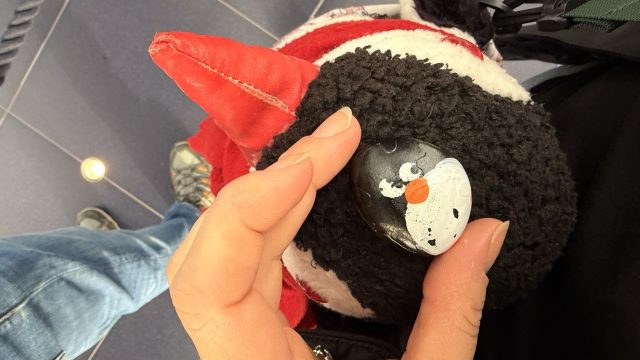 Hand-painted penguin stone #851 hidden at Hangar-7, Salzburg, Austria (photo 2 of 5)