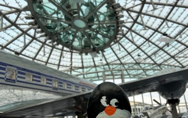 Hand-painted penguin stone #851 hidden at Hangar-7, Salzburg, Austria