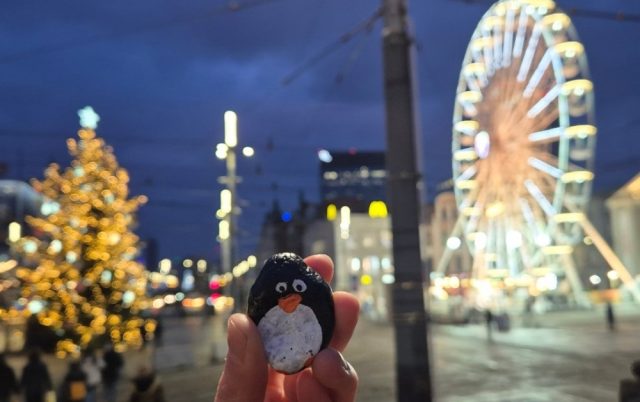 Hand-painted penguin stone #270 hidden at Flower Plaza, Katowice, Poland (photo 4 of 4)