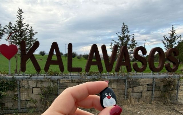 Hand-painted penguin stone #940 hidden at Kalavasos Sign, Kalavasos, Cyprus