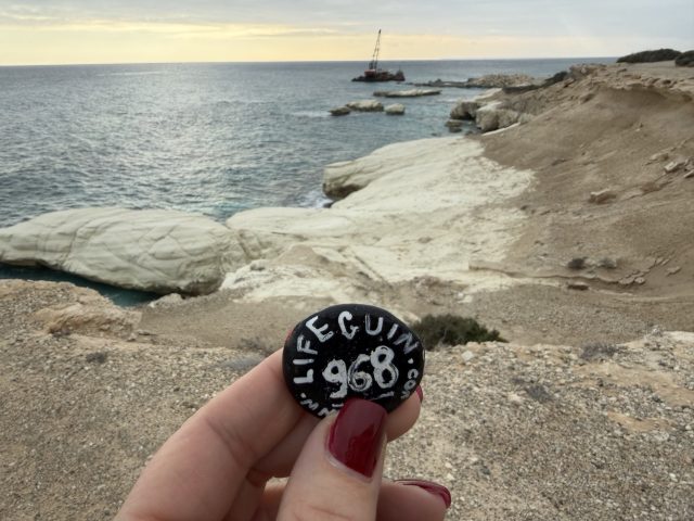 Hand-painted penguin stone #968 hidden at White Rocks, Cyprus (photo 2 of 4)