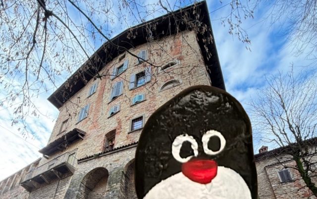 Hand-painted penguin stone #906 hidden at Antico Lavatoio, Bergamo, Italy