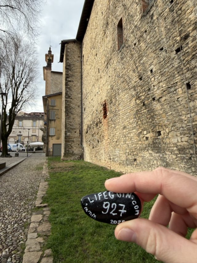 Hand-painted penguin stone #927 hidden at Monumento alla Lente, Bergamo, Italy (photo 5 of 5)