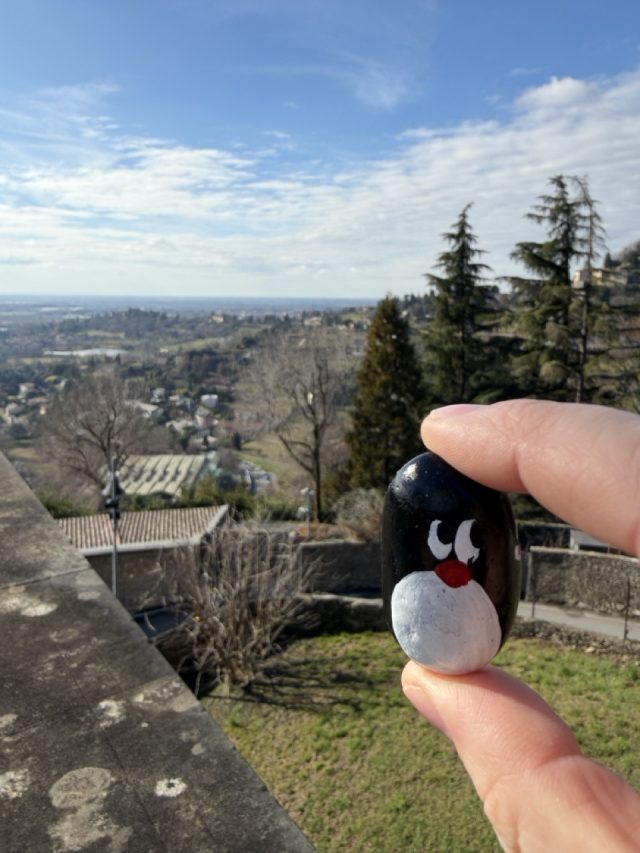 Hand-painted penguin stone #942 hidden at St John's Park, Bergamo, Italy (photo 3 of 5)