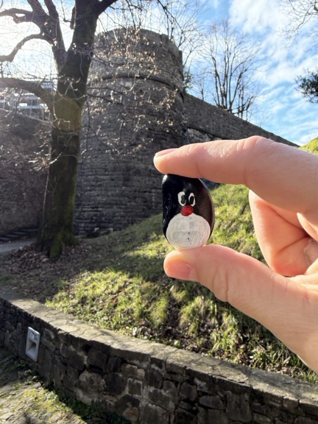 Hand-painted penguin stone #978 hidden at Torre Castello San Vigilio, Bergamo, Italy (photo 5 of 5)