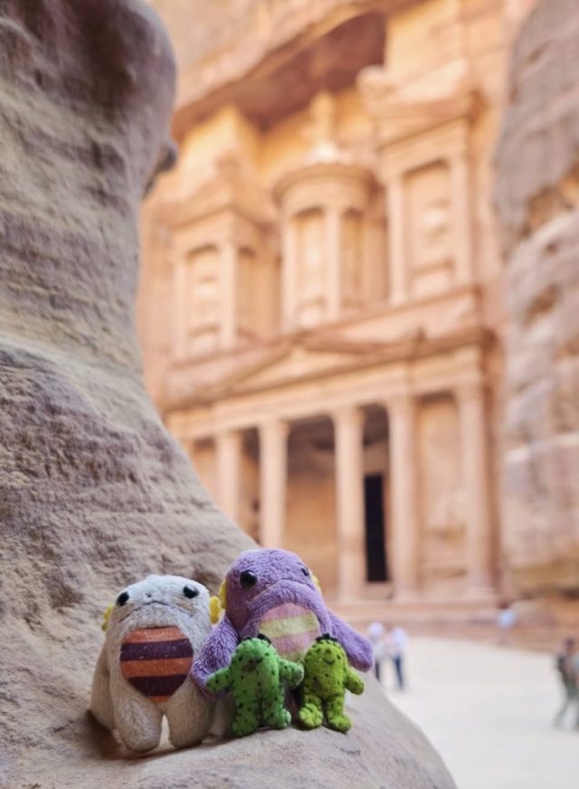 Hand-painted penguin stone #571 hidden at The Treasury, Petra, Jordan (photo 4 of 5)