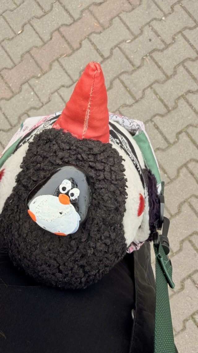 Hand-painted penguin stone #861 hidden at Park Cihelna, Prague, Czechia (photo 2 of 5)