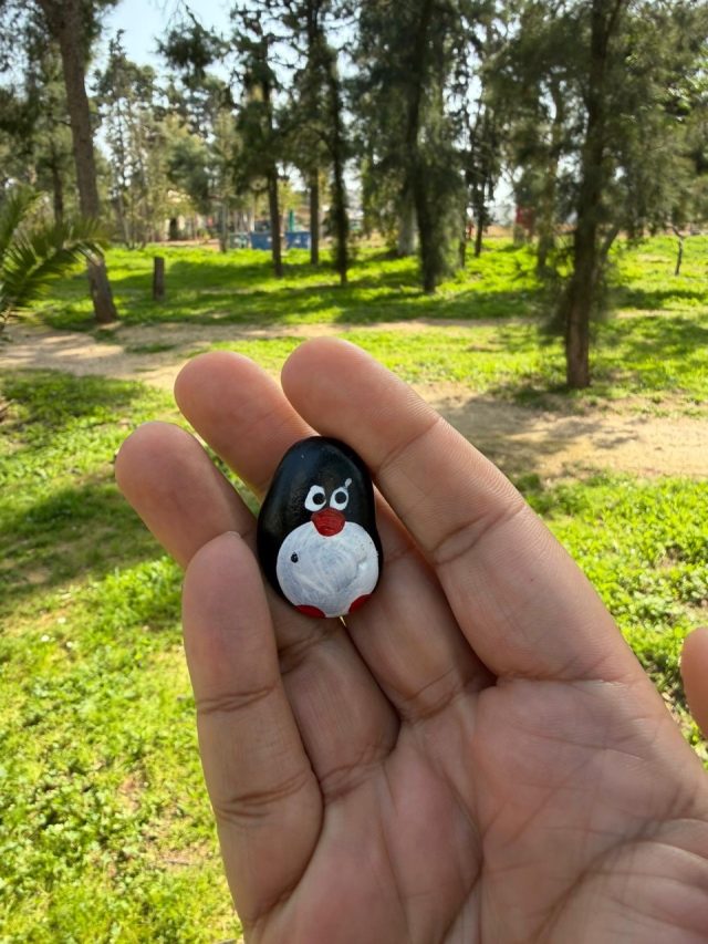 Hand-painted penguin stone #958 hidden at Alsos of Nea Smyrni, Athens, Greece (photo 5 of 5)