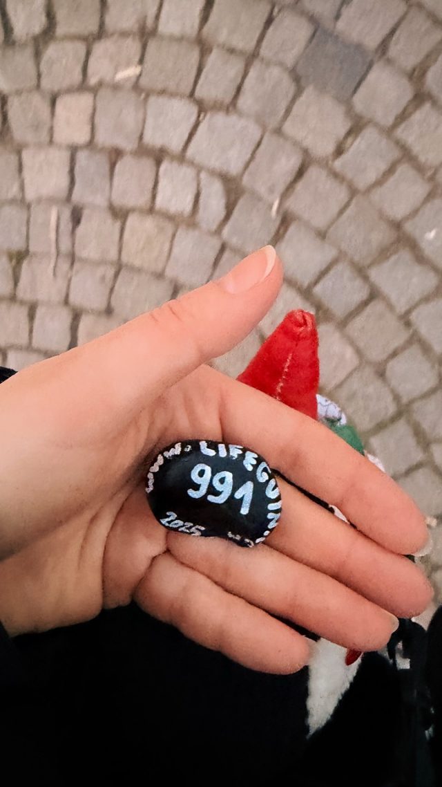 Hand-painted penguin stone #991 hidden at Vysehrad Viewpoint, Prague, Czechia (photo 3 of 5)