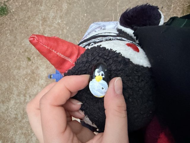 Hand-painted penguin stone #1042 hidden at Tree at Park in Topolcianky, Topolcianky, Slovakia (photo 2 of 5)