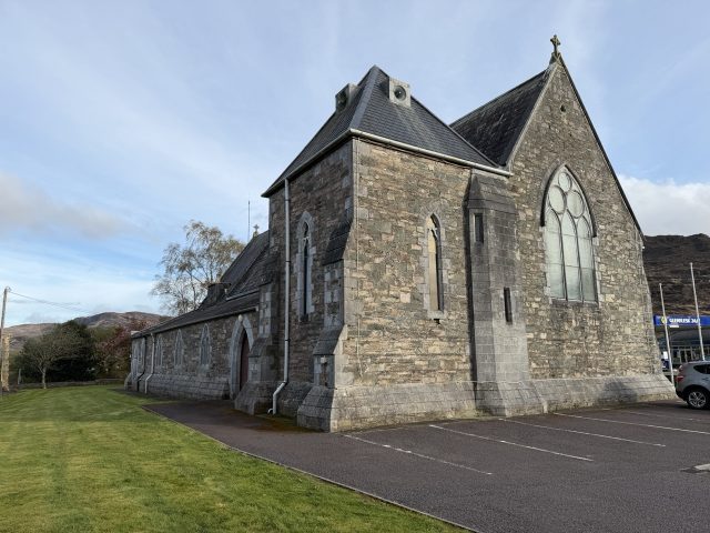 Hand-painted penguin stone #1078 hidden at St. Agatha's Catholic Church, Glenflesk, Ireland (photo 2 of 5)