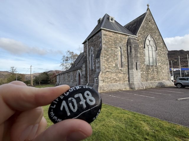 Hand-painted penguin stone #1078 hidden at St. Agatha's Catholic Church, Glenflesk, Ireland (photo 3 of 5)