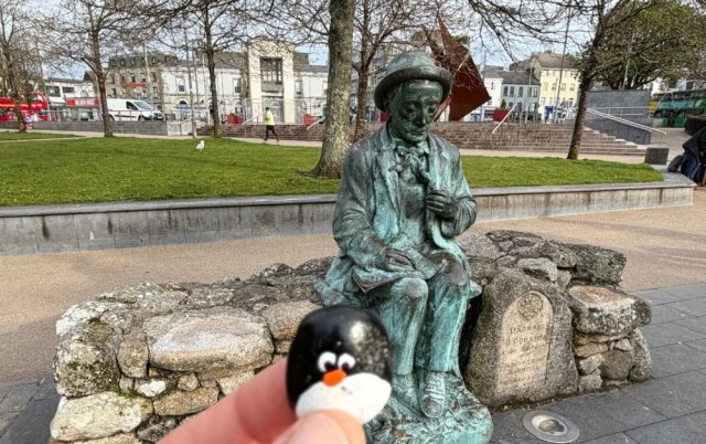 Hand-painted penguin stone #1086 hidden at Eyre Square, Galway, Ireland
