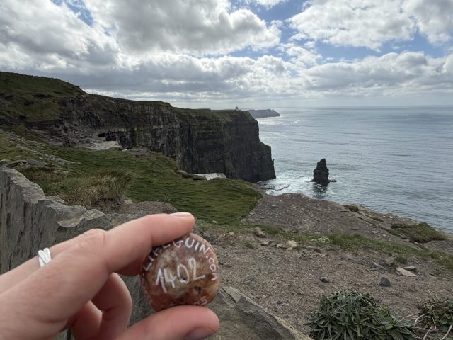 Hand-painted penguin stone #1402 hidden at Cliffs of Moher, Slievenageeragh, Ireland (photo 2 of 5)