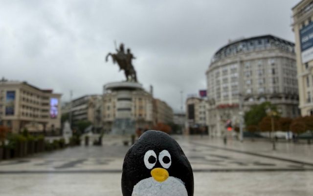 Hand-painted penguin stone #1009 hidden at Stone Bridge, Skopje, North Macedonia