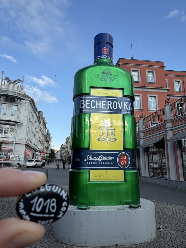 Hand-painted penguin stone #1018 hidden at The Home of Becherovka, Karlove Vary, Czechia (photo 2 of 5)