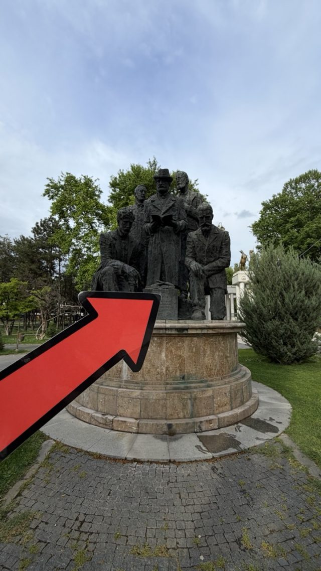 Hand-painted penguin stone #1150 hidden at Monument to the Founders of IMRO 1893, Skopje, North Macedonia (photo 5 of 5)