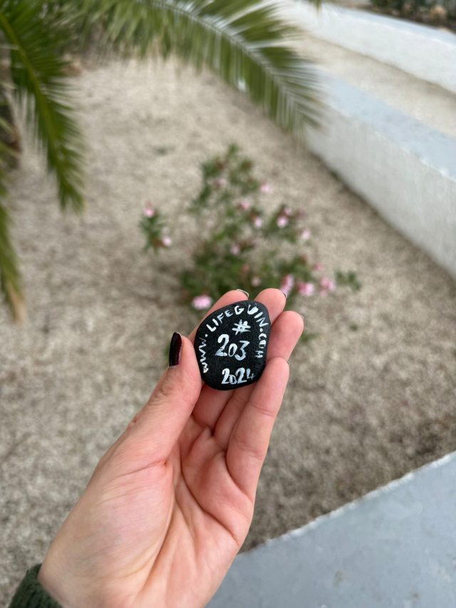 Hand-painted penguin stone #203 hidden at Mirador Blanc, Altea, Spain (photo 3 of 5)