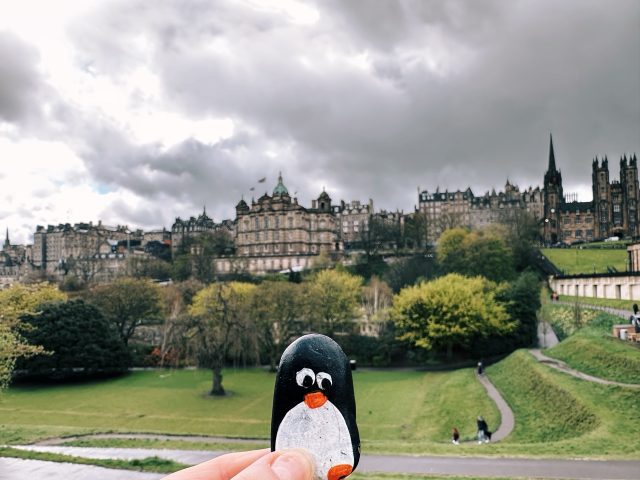Hand-painted penguin stone #360 hidden at National Monument of Scotland, Edinburgh, United Kingdom (photo 2 of 4)