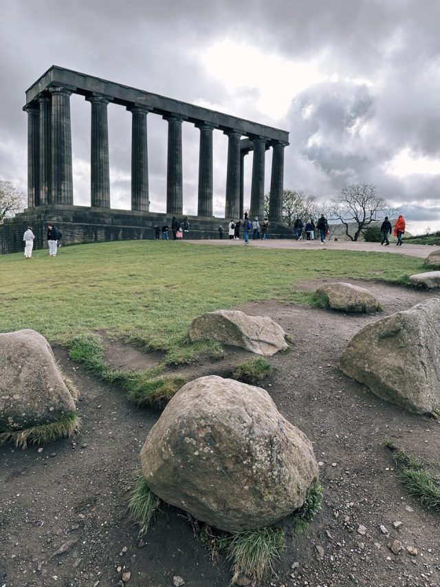 Hand-painted penguin stone #360 hidden at National Monument of Scotland, Edinburgh, United Kingdom (photo 4 of 4)