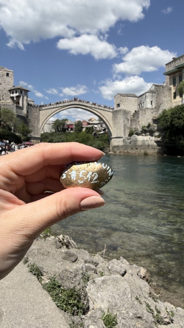 Hand-painted penguin stone #512 hidden at Mostar Old Bridge Photopoint, Mostar, Bosnia and Herzegovina (photo 3 of 5)