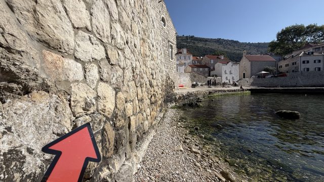 Hand-painted penguin stone #893 hidden at Lovrjenac Fort, Dubrovnik, Croatia (photo 5 of 5)