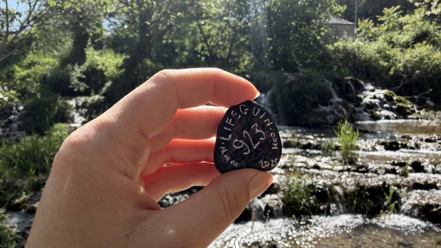 Hand-painted penguin stone #923 hidden at Mini waterfall, Kravica Waterfalls, Bosnia and Herzegovina (photo 2 of 5)