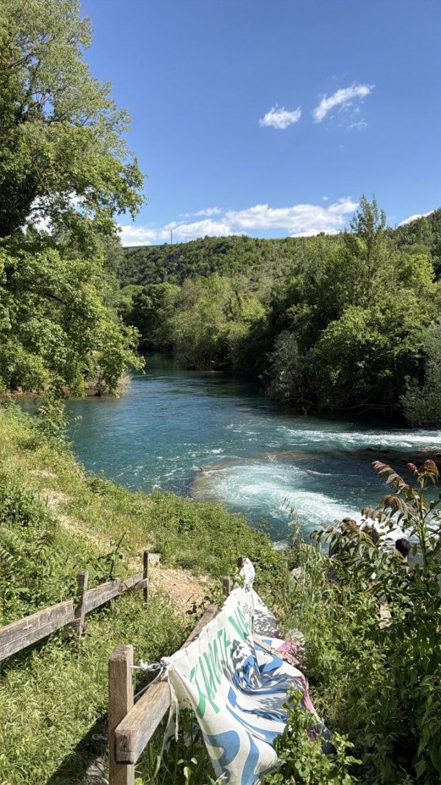 Hand-painted penguin stone #930 hidden at Stone at Kravica Waterfalls, Studenci, Bosnia and Herzegovina (photo 4 of 5)