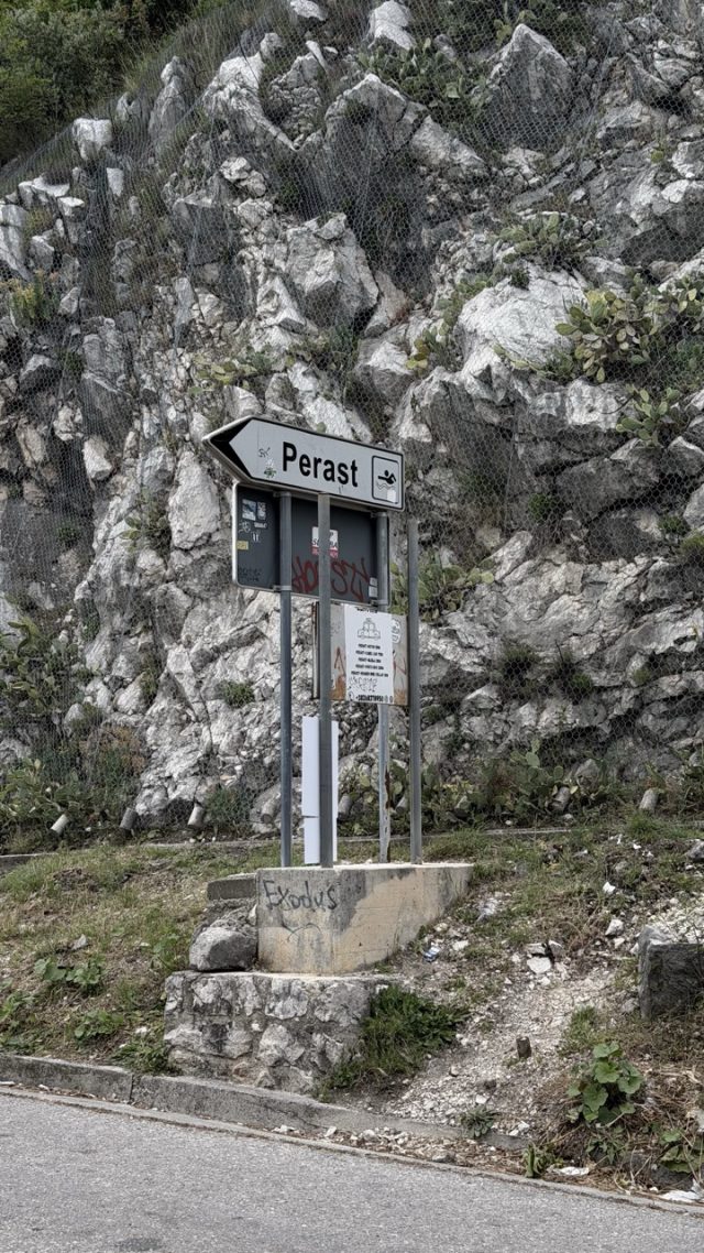 Hand-painted penguin stone #988 hidden at Perast Sign, Perast, Montenegro (photo 4 of 5)