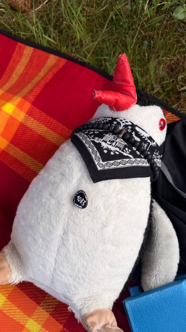 Hand-painted penguin stone #1083 hidden at Tree at Ramsau Beach, Ramsau am Dachstein, Austria (photo 2 of 5)