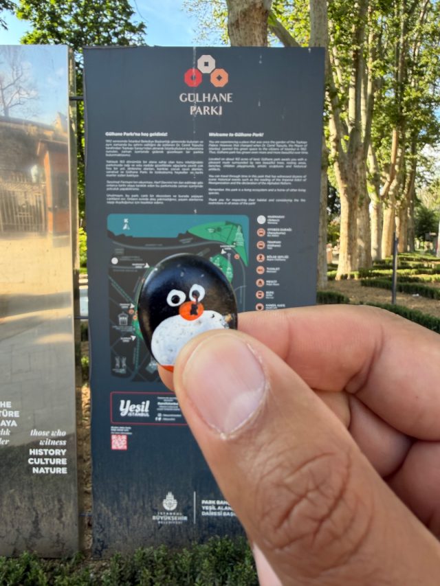 Hand-painted penguin stone #1144 hidden at Gulhane Park, Istanbul, Turkiye