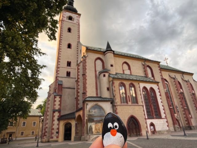 Hand-painted penguin stone #1154 hidden at Church of the Assumption, Banska Bystrica, Slovakia (photo 2 of 5)