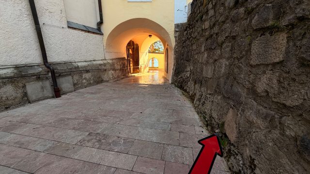Hand-painted penguin stone #1162 hidden at St. Wolfgang Church, St. Wolfgang im Salzkammergut, Austria (photo 4 of 5)