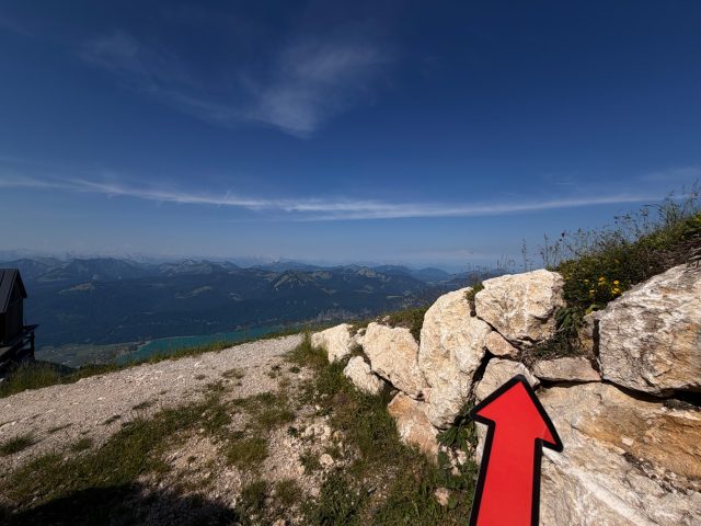 Hand-painted penguin stone #1257 hidden at Rocks at Entrance, Schafberg, Austria (photo 3 of 5)