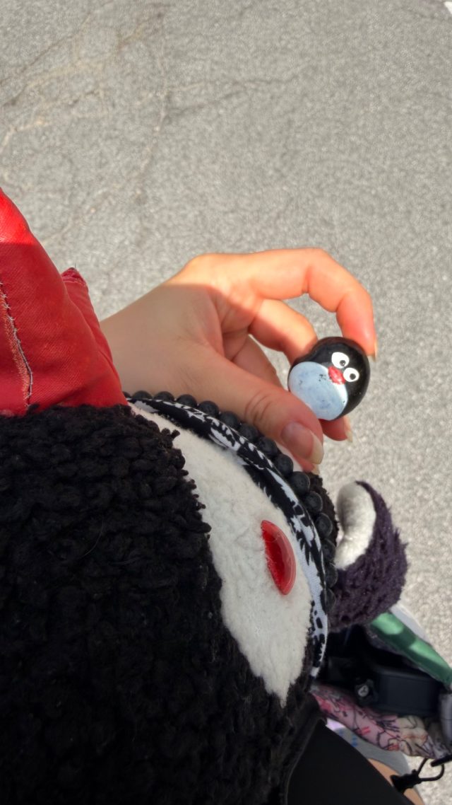 Hand-painted penguin stone #1281 hidden at Dachstein Turlwand Bus Stop, Ramsau am Dachstein, Austria (photo 2 of 5)