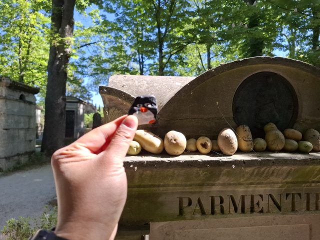 Hand-painted penguin stone #287 hidden at Pere Lachaise, Paris, France (photo 2 of 5)