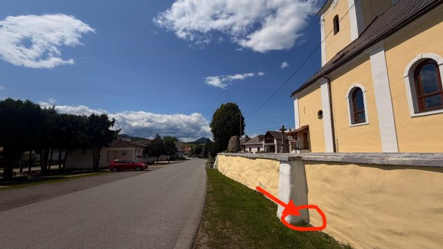 Hand-painted penguin stone #1106 hidden at Church of Saints Simon and Jude, Tulcik, Slovakia (photo 4 of 5)
