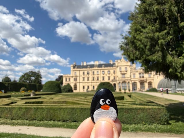 Hand-painted penguin stone #1161 hidden at Lednice Castle Garden, Lednice, Czechia (photo 5 of 5)