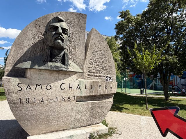 Hand-painted penguin stone #1168 hidden at Statue of Samo Chalupka, Bratislava, Slovakia (photo 4 of 4)
